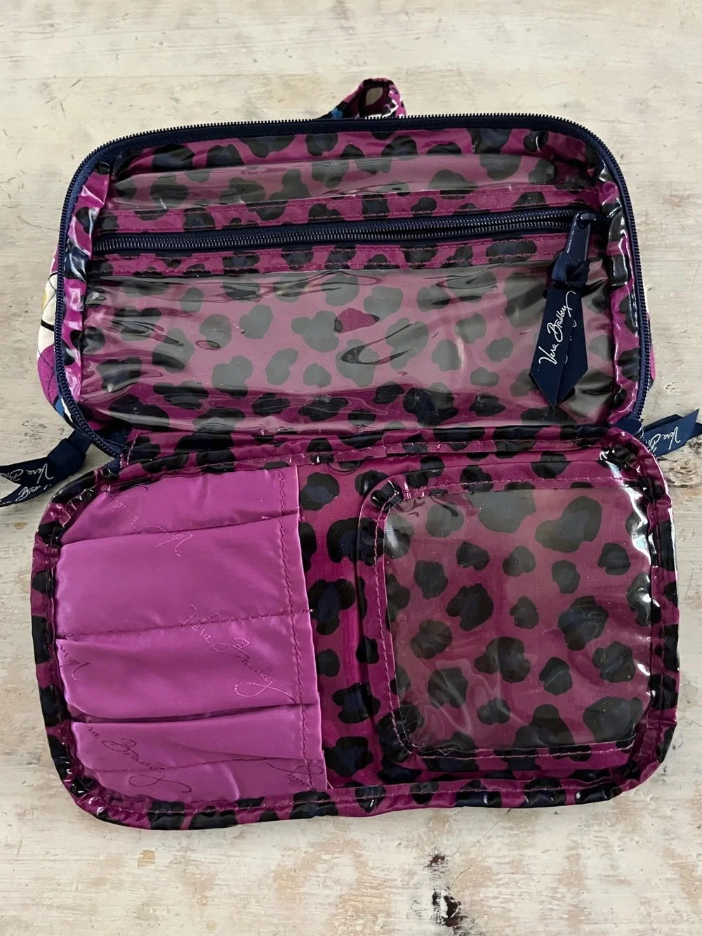 Vera Bradley quilted cosmetic pouch features the retired African Violet floral